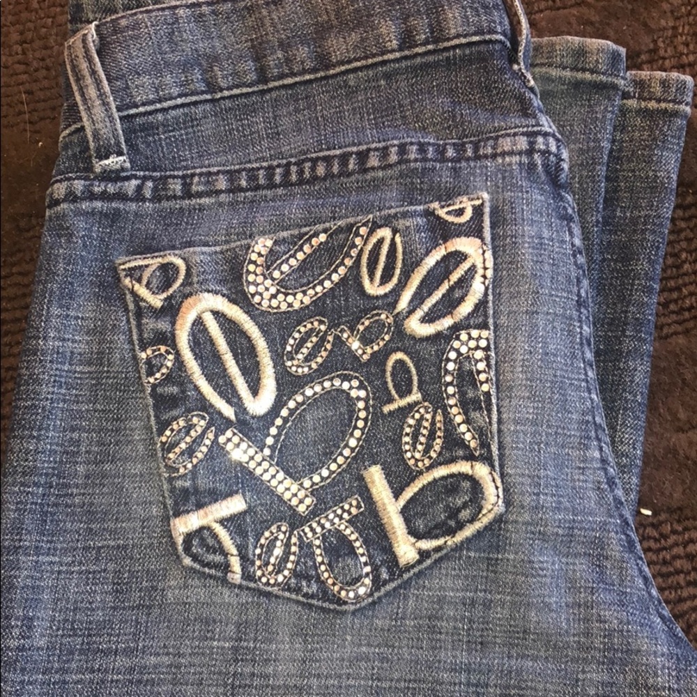 Bebe jeans plain with detailing on the butt